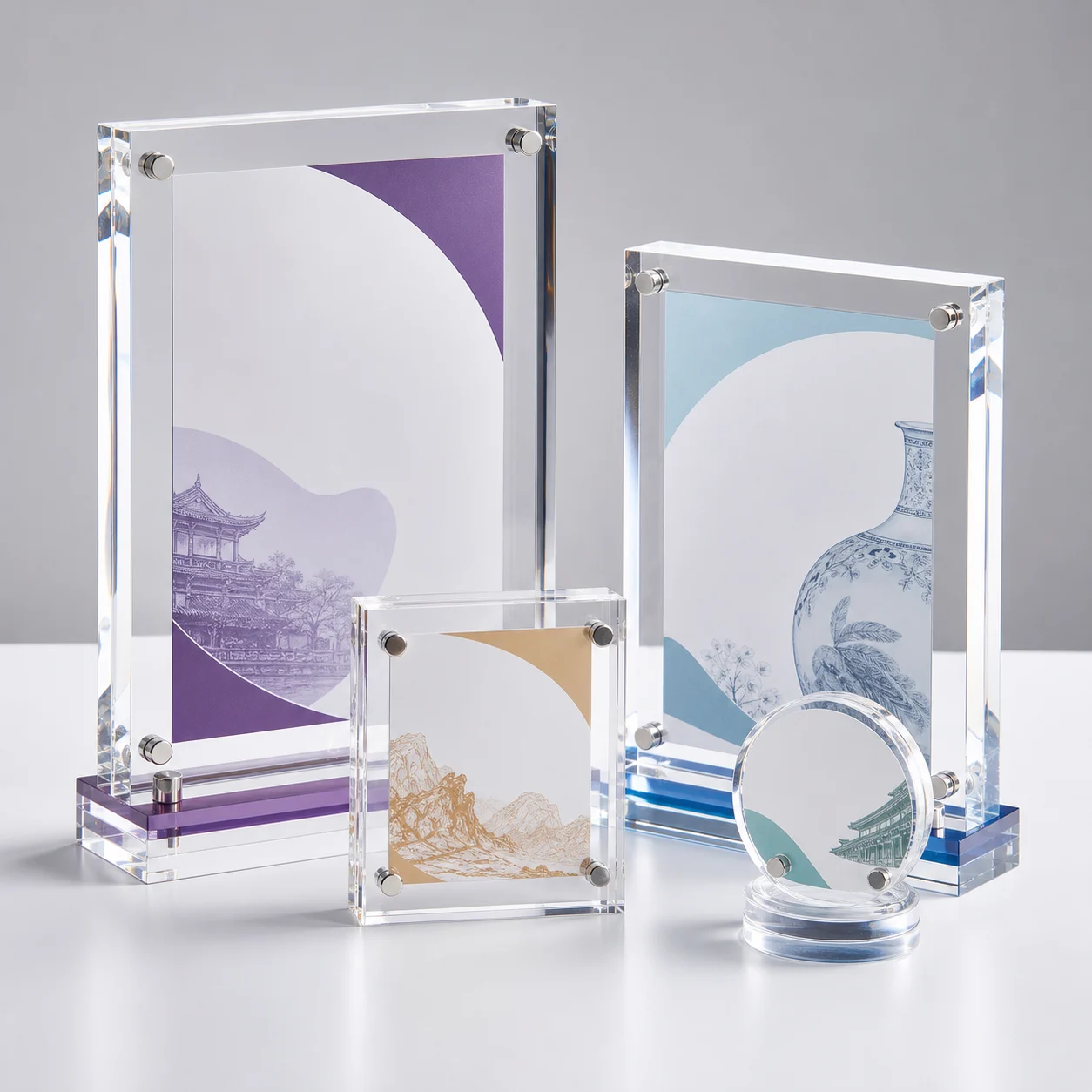Custom acrylic display plaques with printed artwork on weighted bases