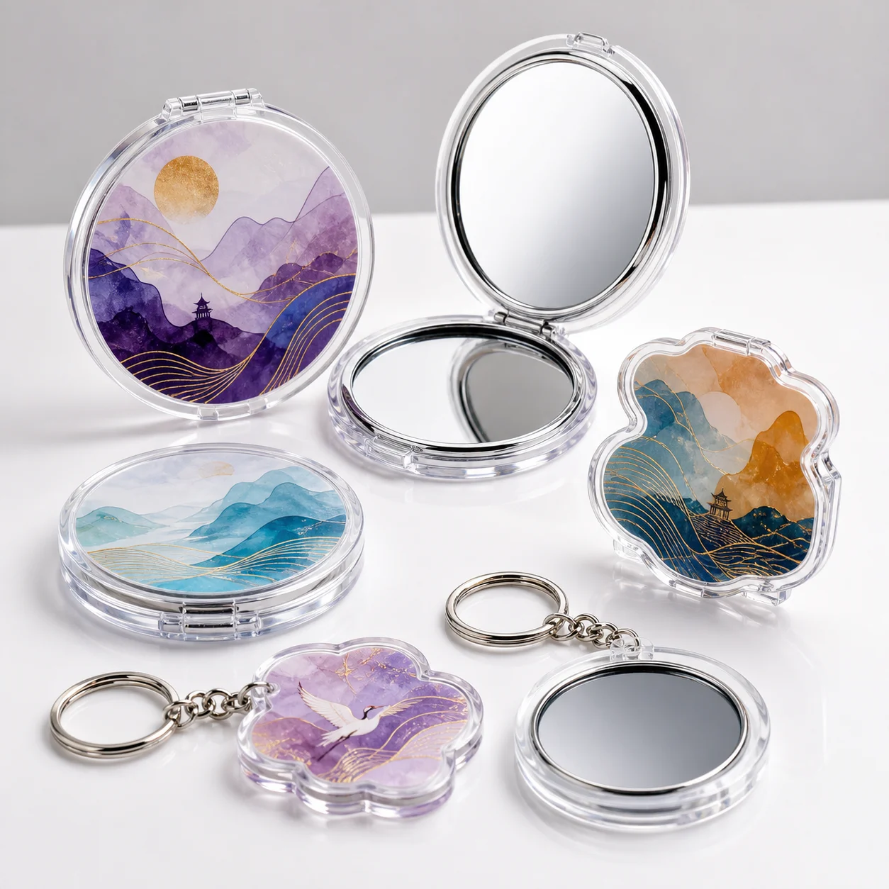 Acrylic pocket mirrors and mirror keychains printed with mountain landscape artwork